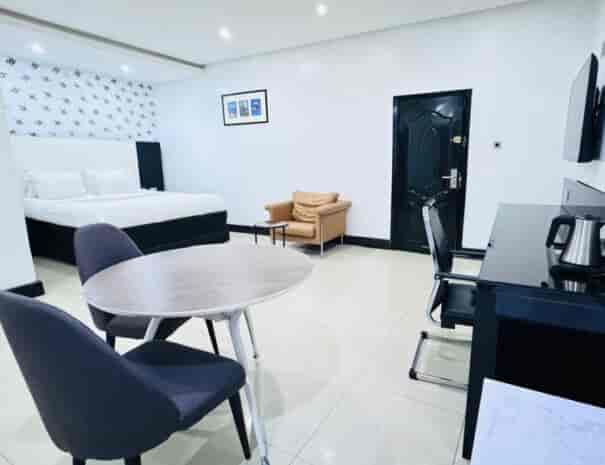 Kaduna Hall at Novotel: Functional bleisure suite for remote work and corporate event planning.