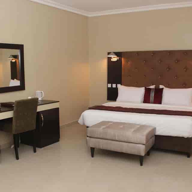 Eastgate Hotel Lekki room with workspace for business conferences and corporate travel.