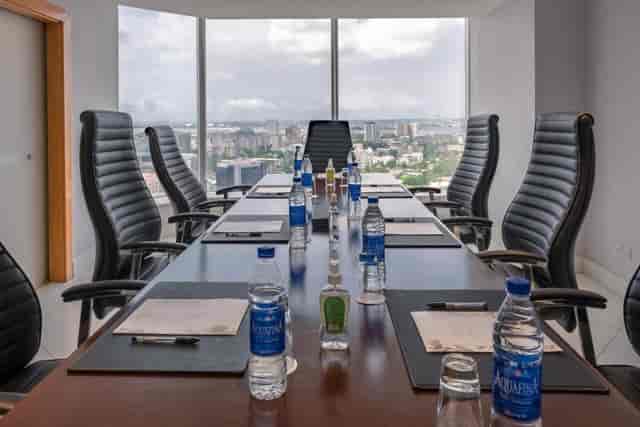 Boardroom-style meeting room in Twin Water Lagos with ocean view for corporate events and workshops.