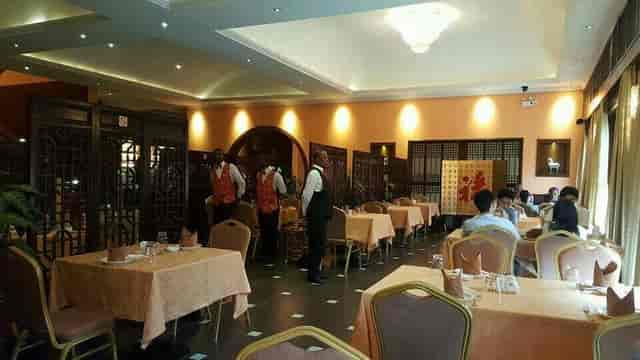 Private dining room at ZEN Garden with banquet setup for corporate events and formal meetings.