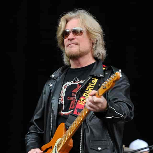 Classic rock headline act performing on the main stage at Ronnie Dee Events Centre outdoor concert.