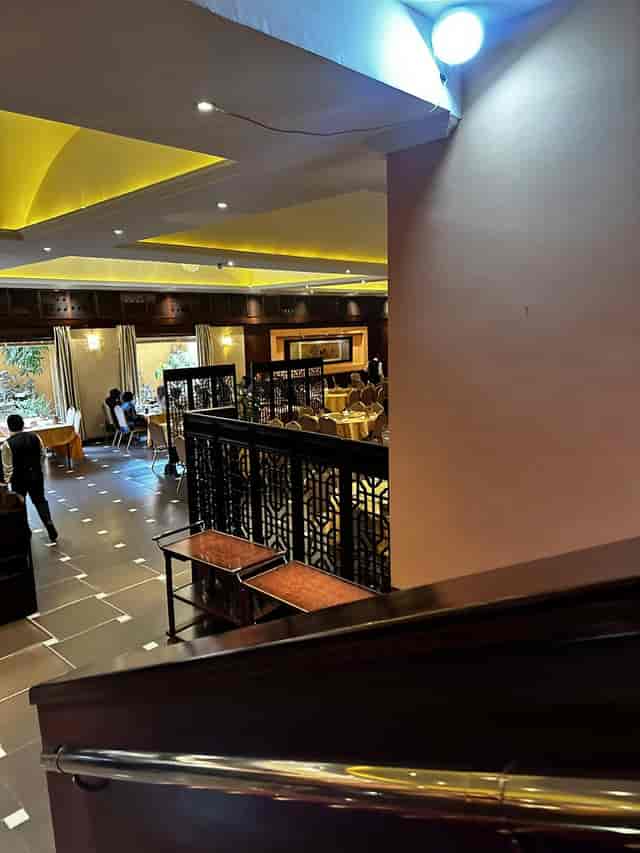 Zen Banquet Hall dining area with tiered tables for formal events and corporate gatherings.