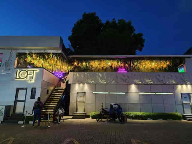 The Loft Ikoyi: Modern multi-level venue with neon lighting for social mixers and VIP after-parties.