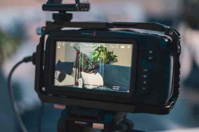 Premium podcast studio with professional video camera for events and audiovisual production.
