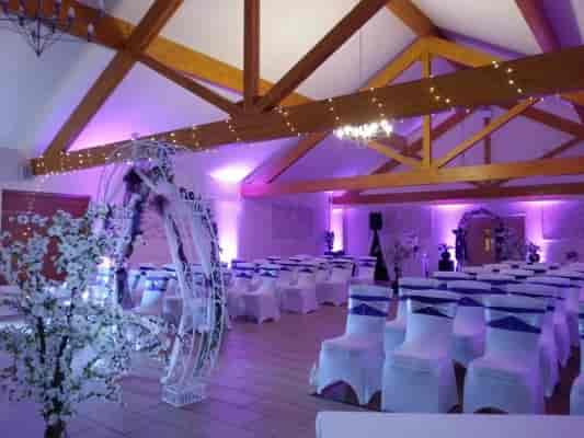 Rustic-chic wedding ceremony setup with floral staging at Draycote Hotel for event venue hire.