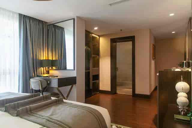 The Piano Bistro guest room with desk for corporate travel and business meetings.