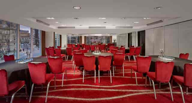 Park Plaza Leeds round-table conference room with red carpet for business meetings and events.