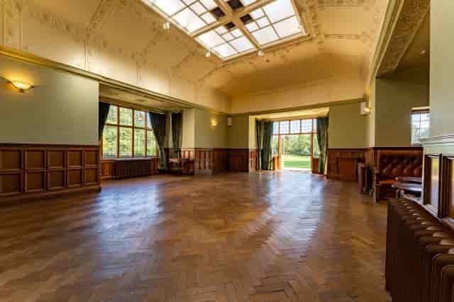 Elegant wood-paneled event space in York, perfect for intimate weddings and corporate workshops.