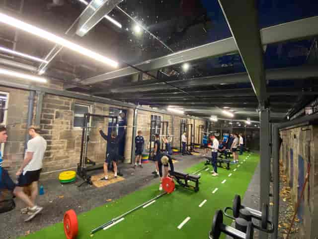 Industrial-chic Sports Hub gym for team-building workshops and wellness retreats.