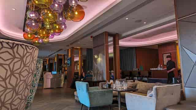 Contemporary hotel lounge bar for professional networking and corporate breakout events.