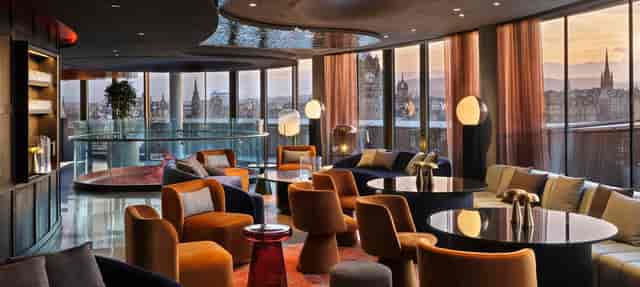 Modern rooftop lounge with city views for VIP cocktail receptions and networking events.