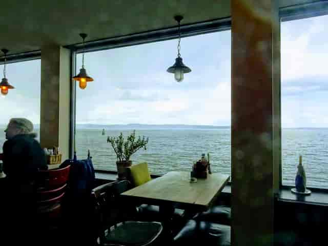 Old Chain Pier venue with floor-to-ceiling water views for board retreats and VIP events.