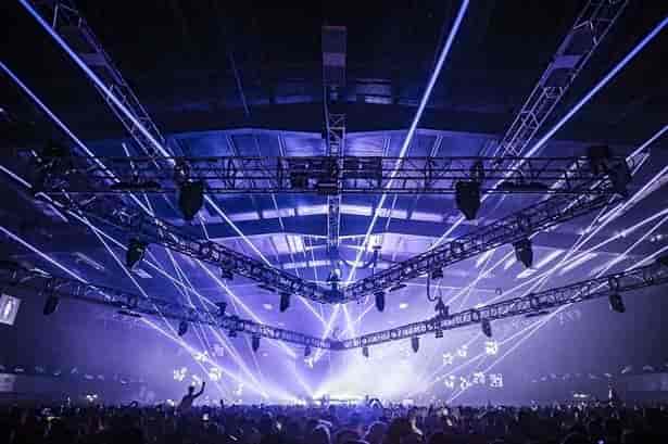 Concert hall at Royal Highland Centre with truss rigging and laser lighting for event production.