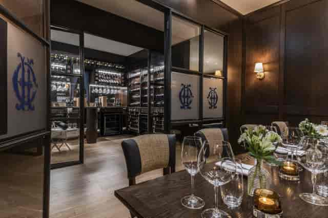 VIP private dining room in The Balmoral Hotel with elegant wine cellar for luxury events.