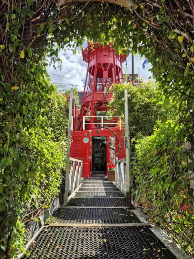 Red ship restaurant entrance at Vessel 11, ideal for unique event venues and corporate functions.