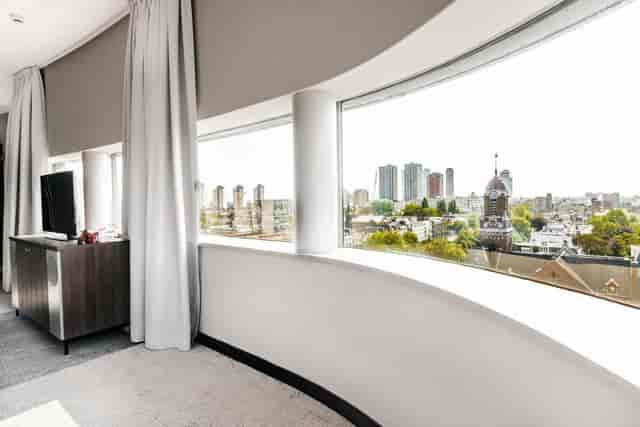Bilderberg Parkhotel Rotterdam executive suite with city view for business meetings and VIP events.