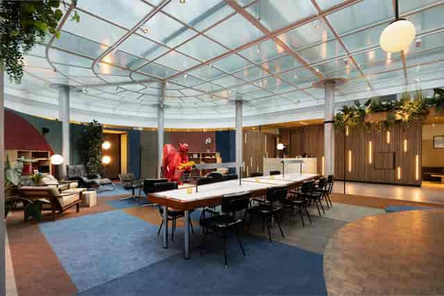 Co-working space at Motto by Hilton Rotterdam Blaak for networking and small group events.