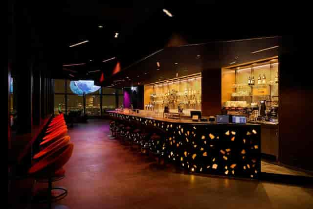 Modern Celest lounge with custom bar lighting for VIP receptions and corporate networking events.