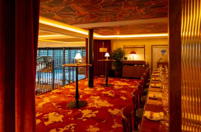 Intimate event space at The Balcony Marceline featuring mood lighting for VIP receptions and dining.