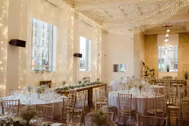 Elegant wedding and gala event space with fairy light decor at Oh Me Oh My.