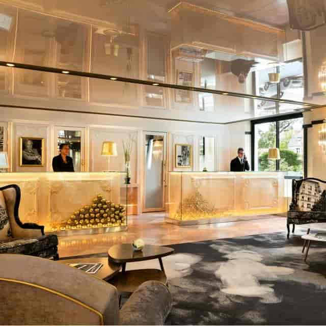 Luxe Cannes boutique hotel reception for VIP arrivals and sophisticated corporate event registration.