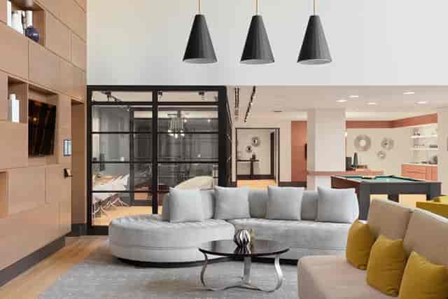 Alexander Community Clubroom: Hybrid boardroom and networking lounge for corporate events.