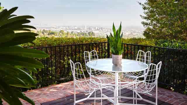 Covered patio at The James Event Center featuring a scenic overlook for VIP networking events.