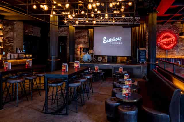 Versatile event space in Eastcheap Records with industrial aesthetics for corporate gatherings.