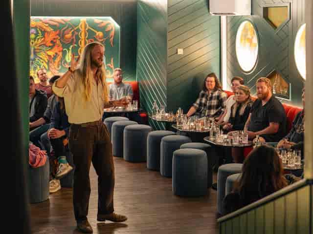 Garden restaurant and whisky lounge with intimate seating for corporate networking events.