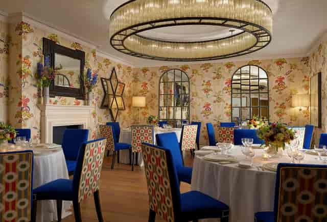 Elegant Lyric Room at Covent Garden Hotel, perfect for intimate dinners and upscale events.