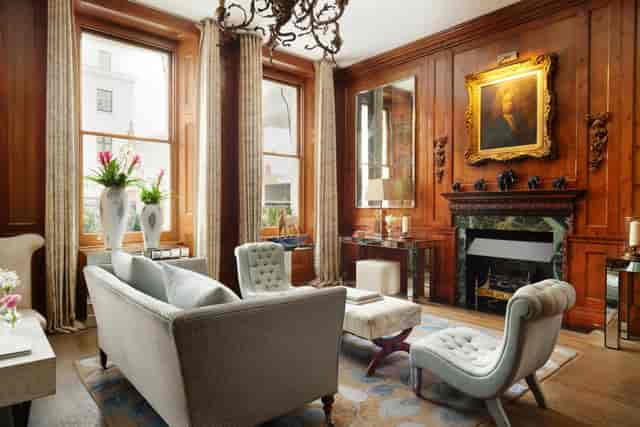Elegant meeting space with plush seating at The Drawing Room, ideal for gatherings and meetings.
