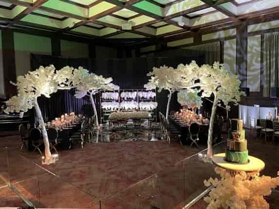 The Atrium at The Harbert Center with bold floral decor for luxury events and gala planning.