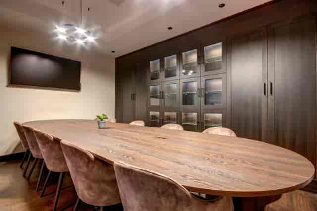 Executive boardroom in City Club Birmingham with AV tech for corporate strategy meetings.