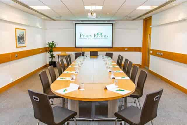 Boardroom meeting room for professional development workshops and collaborative business events.