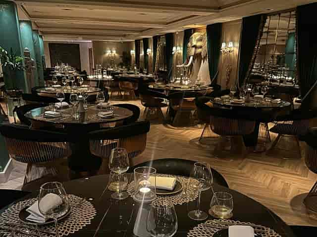 Luxury corporate dinner at Varanasi Boutique with chic round table seating for intimate events.