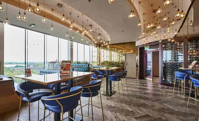 Sky Bar restaurant with floor-to-ceiling windows for informal networking and corporate events.