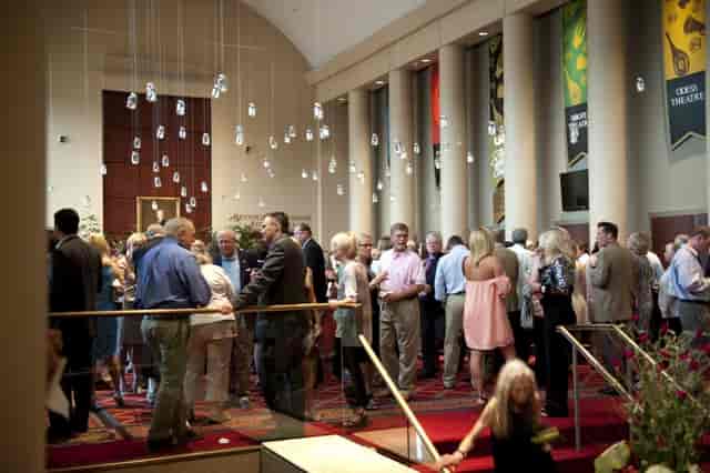 ArtPlay networking reception in grand Alys Stephens Performing Arts Center architecture event.