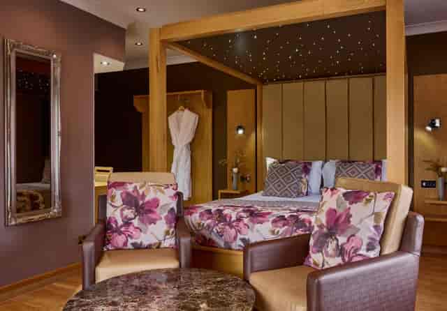 Luxury Fairlawns Hotel suite for VIP speakers and bridal events with modern, cozy decor.