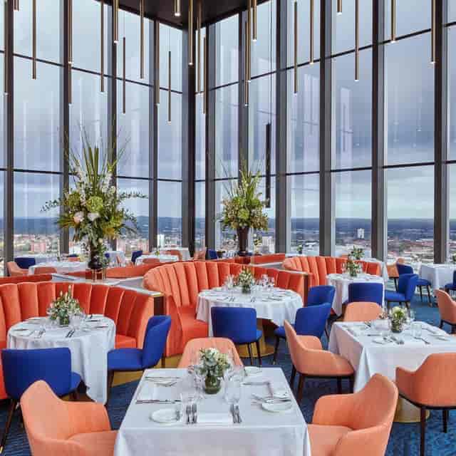 Orelle restaurant architectural glass design for upscale networking and corporate dining events.
