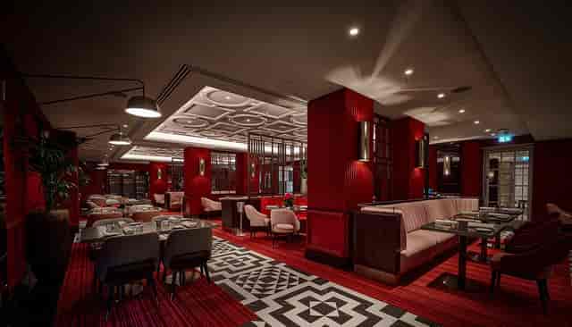 Sophisticated Pem restaurant bar with modern decor for intimate events and networking.