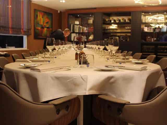 Old Dutch private dining room setup for high-stakes business meetings and formal events.