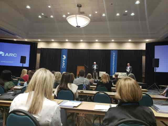 BJCC North Exhibition Hall 1 classroom setup for professional corporate presentation and event.