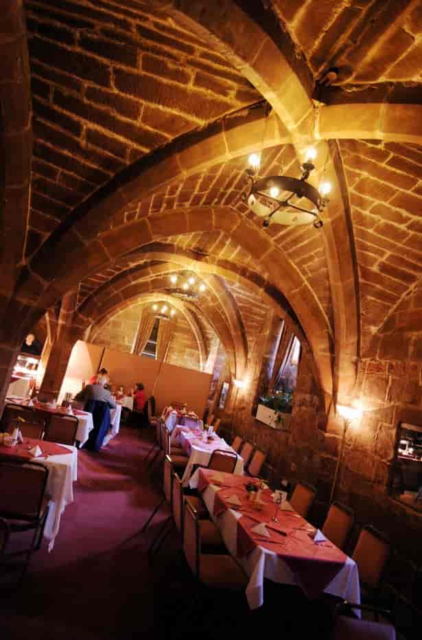 Historic Undercroft venue with stone vaulted ceilings, ideal for intimate dinners and receptions.