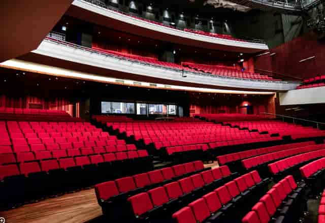 Luxor Theater tiered auditorium for corporate presentations and keynote events.