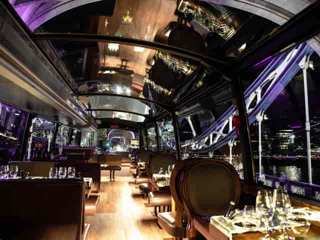 Elegant luxury train dining with plush seating, ideal for upscale events and private dinners.