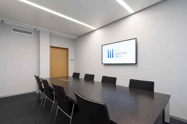 Minimalist HBW Conference Center boardroom for tactical business meetings and corporate strategy.