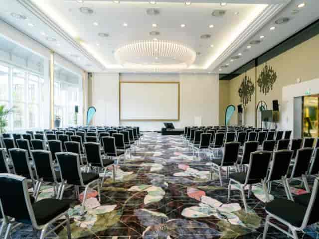 Crossover Stage in Smartvillage ballroom with theater seating for corporate presentations and keynotes.
