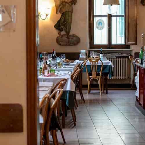 Chef's Table at Acquarello: intimate long-table setting for corporate off-site dinners.