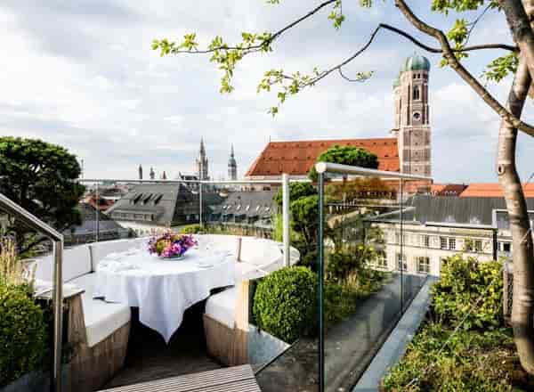 Blue Spa Bar rooftop terrace with semicircular seating for VIP receptions and corporate dinners.