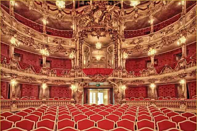 Cuvilliés-Theater interior featuring ornate gold décor for gala awards and keynote presentations.
